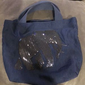 Small Banana Republic Bag with elephant logo.